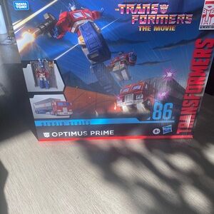 Hasbro Transformers Optimus Prime Action Figure - Red, Blue, and Silver